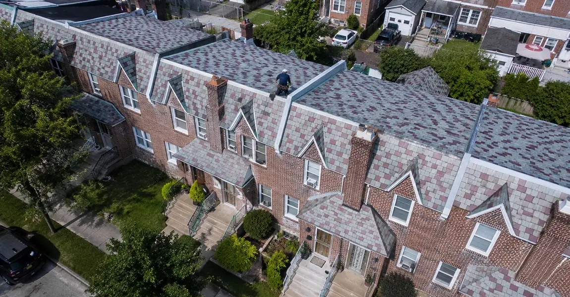 Home Spennato Family Roofing Drone photo of Somerton rowhome roofs reviewed by a Somerton roofing contractor